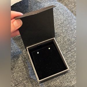 14 carat white gold earrings, .13 carat weight moissanite stones. New with box